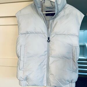 Noize vegan puffy vest in light blue.